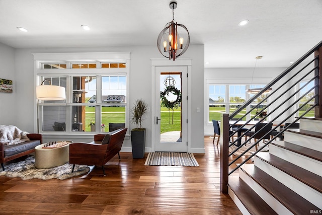 8086 Shepardson Creek Dr, Lafayette, IN 47905 - entryway featuring a chandelier, wood-type flooring, stairs, and recessed lighting