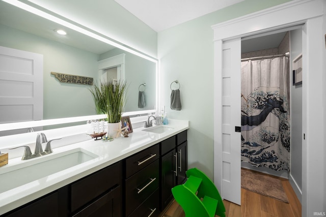 8086 Shepardson Creek Dr, Lafayette, IN 47905 - bathroom featuring wood finished floors and double vanity