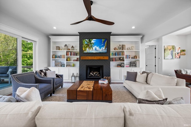 8086 Shepardson Creek Dr, Lafayette, IN 47905 - living room featuring a ceiling fan, a large fireplace, recessed lighting, and built in features