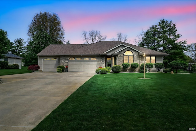 ranch-style home featuring stone siding, driveway, an attached garage, a front lawn, and a shingled roof