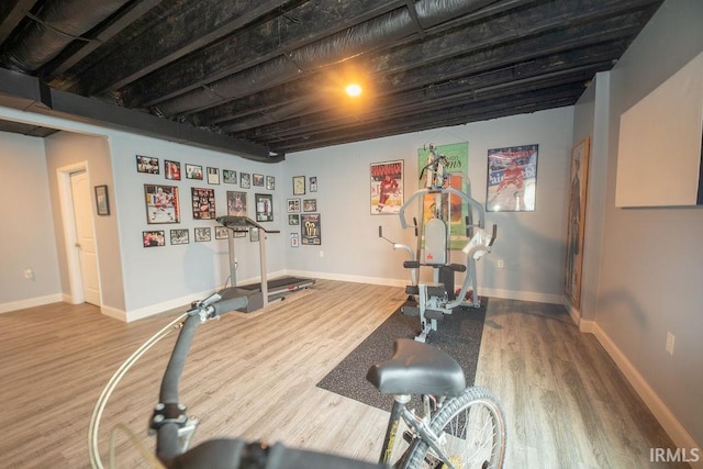 3417 S Tulip Ave, Bloomington, IN 47403 - workout area with wood finished floors and baseboards
