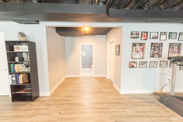 3417 S Tulip Ave, Bloomington, IN 47403 - hallway featuring wood finished floors and baseboards