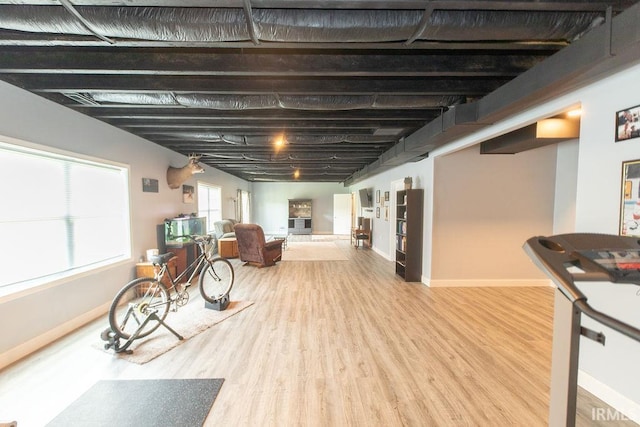 3417 S Tulip Ave, Bloomington, IN 47403 - below grade area with wood finished floors and baseboards