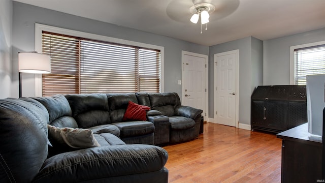 208 S Ohio St, Chandler, IN 47610 - living room with ceiling fan, light wood-style flooring, and baseboards
