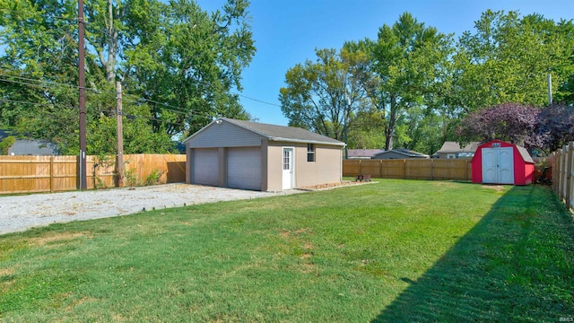 208 S Ohio St, Chandler, IN 47610 - view of yard featuring an outdoor structure and a garage