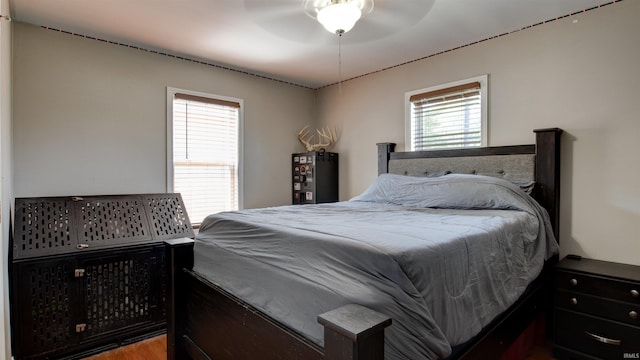 208 S Ohio St, Chandler, IN 47610 - bedroom featuring a ceiling fan and wood finished floors