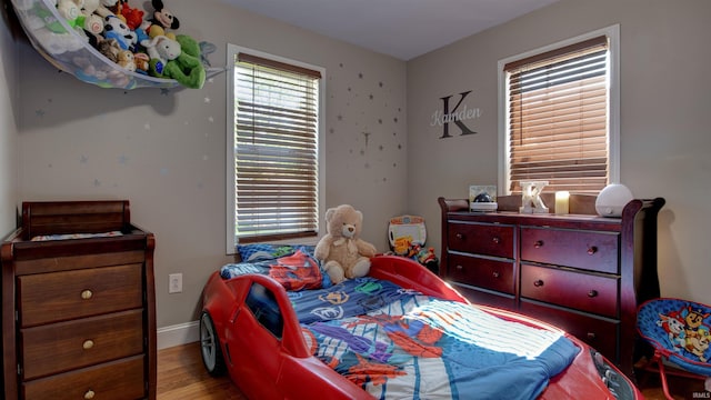 208 S Ohio St, Chandler, IN 47610 - bedroom featuring wood finished floors and baseboards