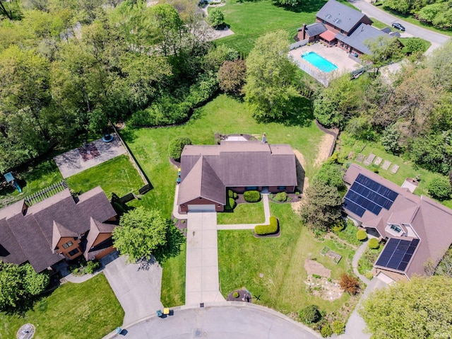 view of property location featuring a pool