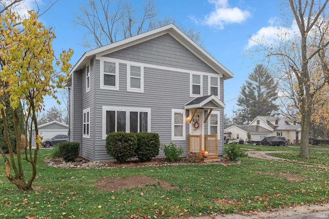 view of front of property with a front lawn