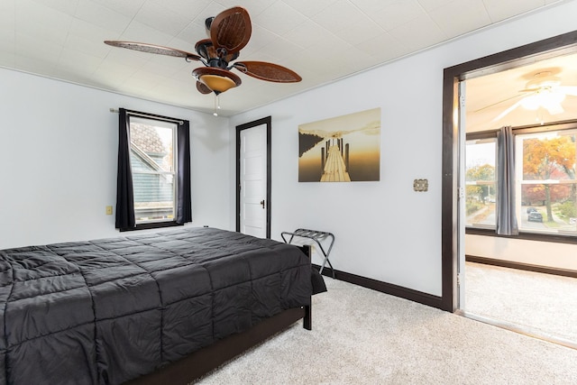 1026 N Michigan St, South Bend, IN 46617 - bedroom featuring carpet floors, baseboards, and ceiling fan