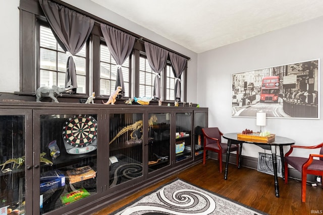 1026 N Michigan St, South Bend, IN 46617 - sitting room with wood finished floors and baseboards