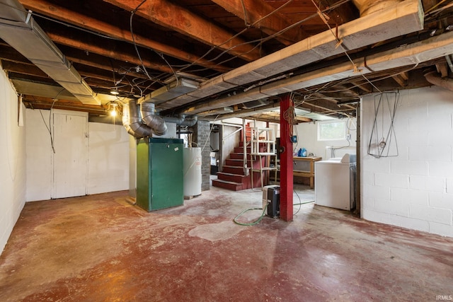 basement featuring water heater, washer / clothes dryer, stairway, and heating unit