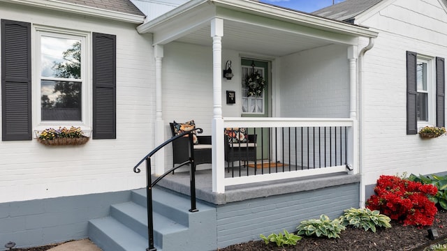 entrance to property with a porch