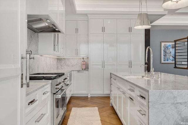 202 W Berry St Unit 810, Fort Wayne, IN 46802 - kitchen featuring range with two ovens, a sink, white cabinetry, crown molding, and range hood