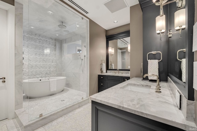 202 W Berry St Unit 810, Fort Wayne, IN 46802 - bathroom featuring two vanities, a freestanding bath, and walk in shower