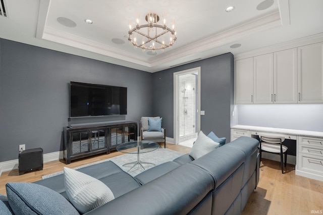 202 W Berry St Unit 810, Fort Wayne, IN 46802 - living room featuring a tray ceiling, light wood finished floors, a chandelier, ornamental molding, and baseboards