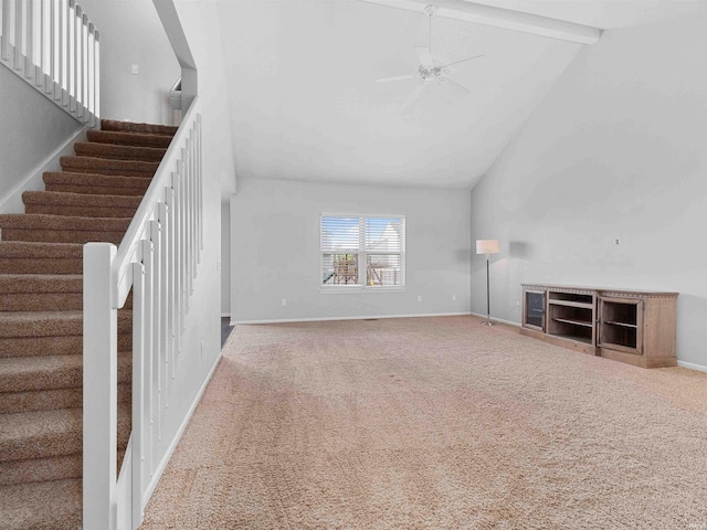 11515 Ballycastle Pl, Fort Wayne, IN 46818 - unfurnished living room featuring high vaulted ceiling, carpet flooring, ceiling fan, stairway, and baseboards