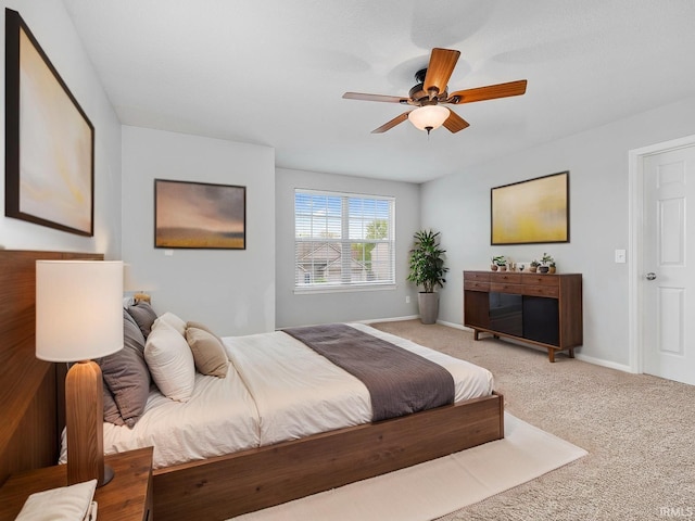 11515 Ballycastle Pl, Fort Wayne, IN 46818 - bedroom featuring carpet floors, a ceiling fan, and baseboards