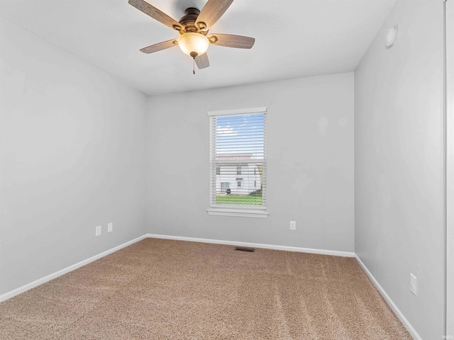 11515 Ballycastle Pl, Fort Wayne, IN 46818 - carpeted empty room with baseboards and a ceiling fan