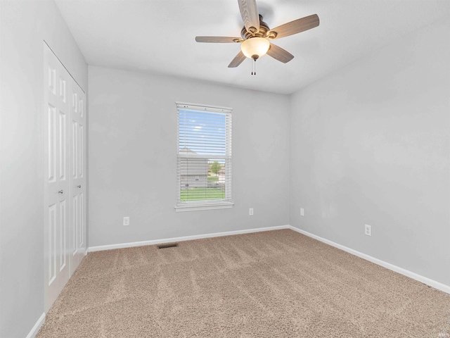 11515 Ballycastle Pl, Fort Wayne, IN 46818 - carpeted empty room with a ceiling fan and baseboards