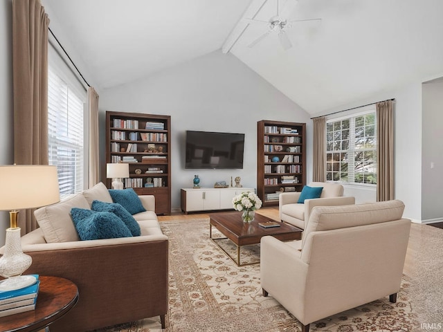 11515 Ballycastle Pl, Fort Wayne, IN 46818 - living room with a ceiling fan, beamed ceiling, high vaulted ceiling, and baseboards