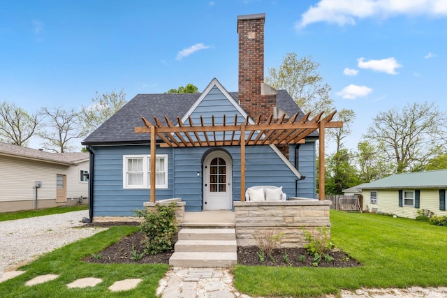 view of front of house with a pergola, a front lawn, a chimney, and roof with shingles