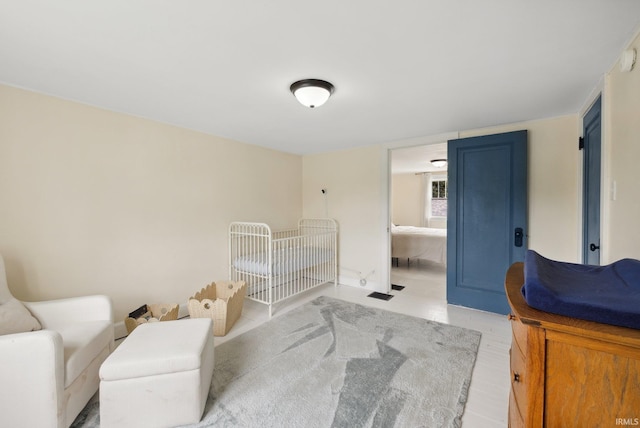 bedroom with light wood finished floors