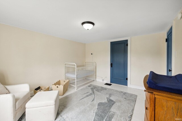 bedroom featuring wood finished floors