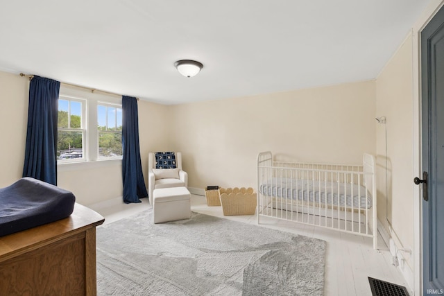 bedroom featuring baseboards