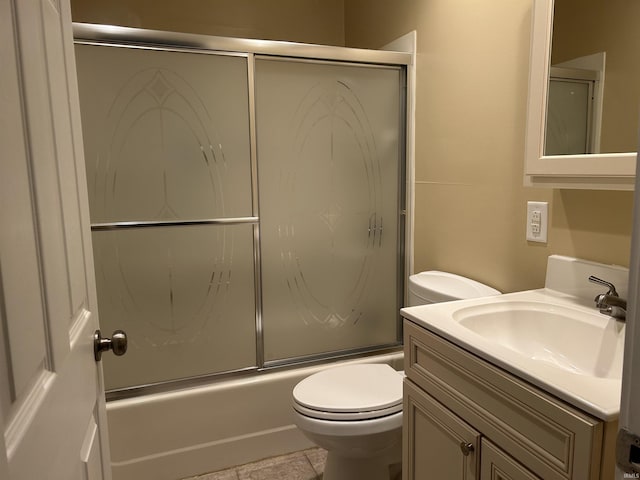 2705 Edgar St, Evansville, IN 47710 - full bathroom featuring toilet, enclosed tub / shower combo, and vanity