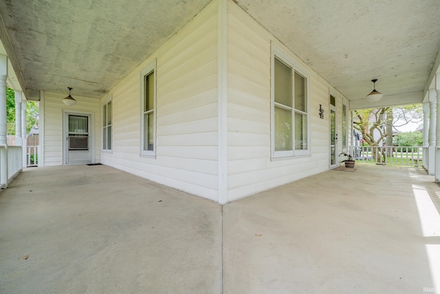 521 S Riverside Dr, Winamac, IN 46996 - view of patio featuring covered porch