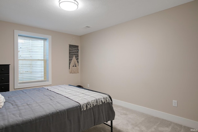 104 Lavender Ct, New Carlisle, IN 46552 - carpeted bedroom with baseboards