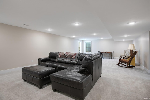 104 Lavender Ct, New Carlisle, IN 46552 - living area with light colored carpet, recessed lighting, and baseboards