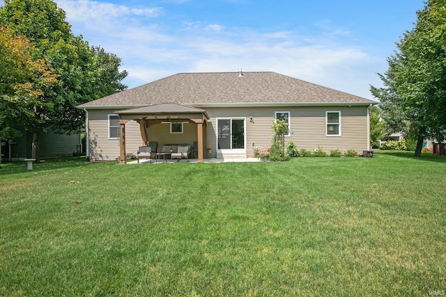 104 Lavender Ct, New Carlisle, IN 46552 - rear view of house featuring a gazebo, a yard, a patio area, and outdoor lounge area