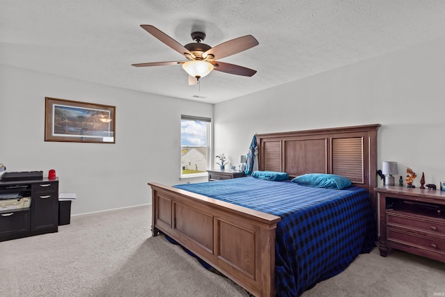 384 Ariel Dr, Kokomo, IN 46901 - bedroom featuring light colored carpet, a ceiling fan, and a textured ceiling