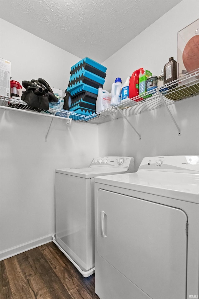 384 Ariel Dr, Kokomo, IN 46901 - laundry room with washer and dryer, dark wood finished floors, and baseboards