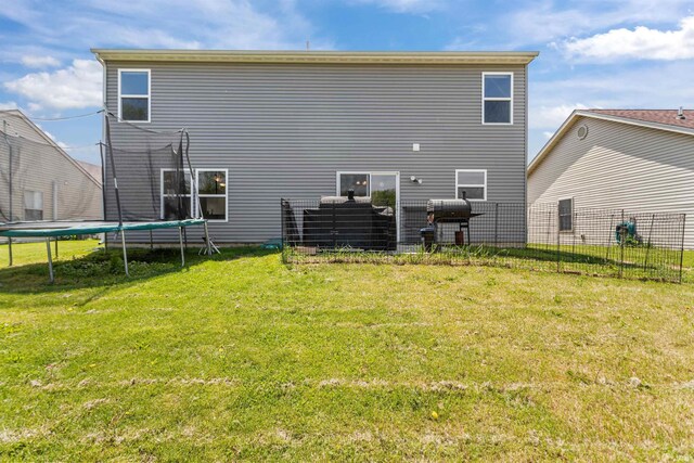 384 Ariel Dr, Kokomo, IN 46901 - back of house featuring a trampoline