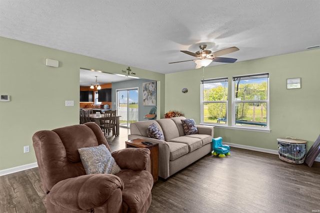 384 Ariel Dr, Kokomo, IN 46901 - living area with baseboards, wood finished floors, a ceiling fan, a chandelier, and a textured ceiling