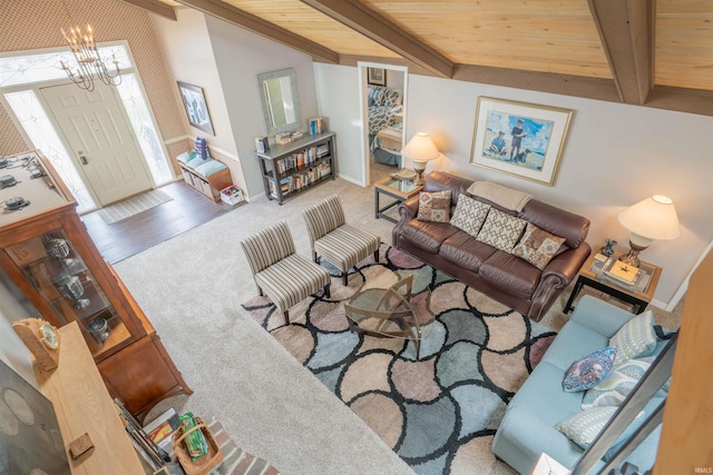 5002 E Oriole Dr, Monticello, IN 47960 - carpeted living room featuring a chandelier, wood ceiling, and baseboards
