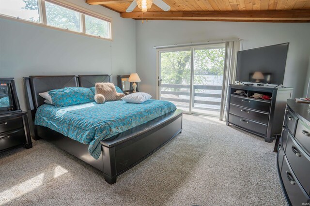 5002 E Oriole Dr, Monticello, IN 47960 - bedroom featuring wood ceiling, beam ceiling, light carpet, access to exterior, and multiple windows
