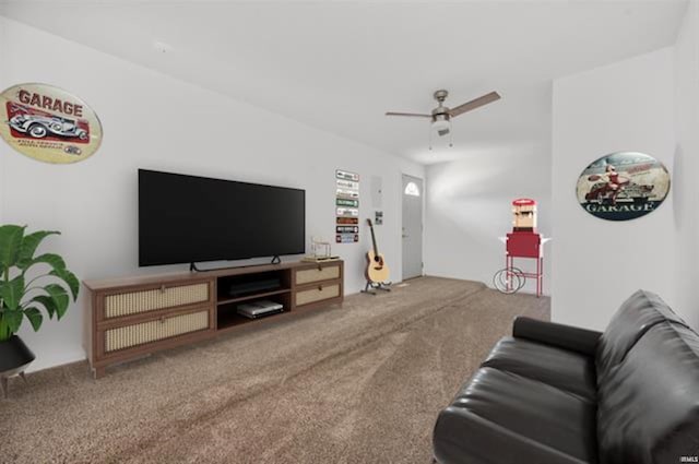 carpeted living room with ceiling fan