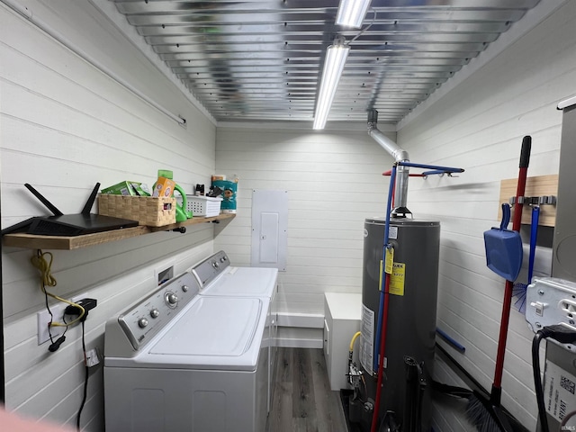 18065 Buzzard Roost Rd, Magnet, IN 47520 - laundry room with washer and dryer, gas water heater, wood finished floors, and wooden walls