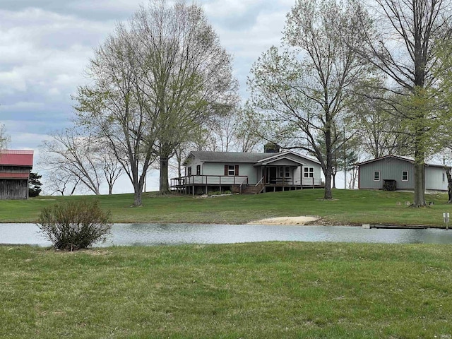 18065 Buzzard Roost Rd, Magnet, IN 47520 - view of grassy yard with a deck with water view