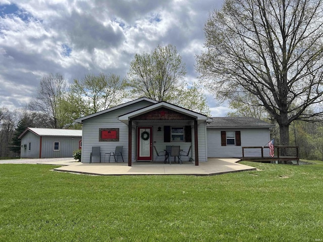 18065 Buzzard Roost Rd, Magnet, IN 47520 - rear view of house featuring a lawn and a deck