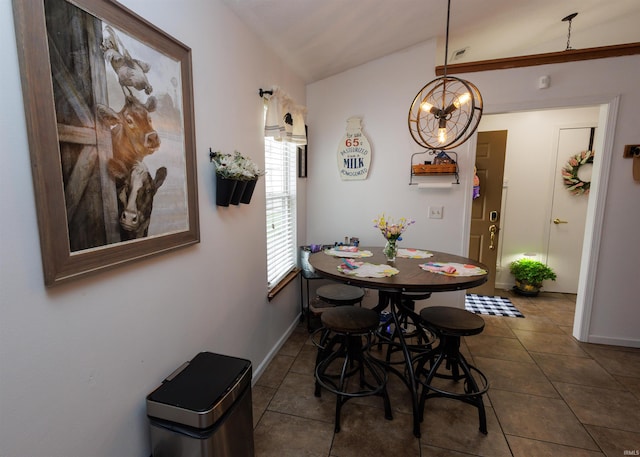 dining area featuring tile patterned flooring