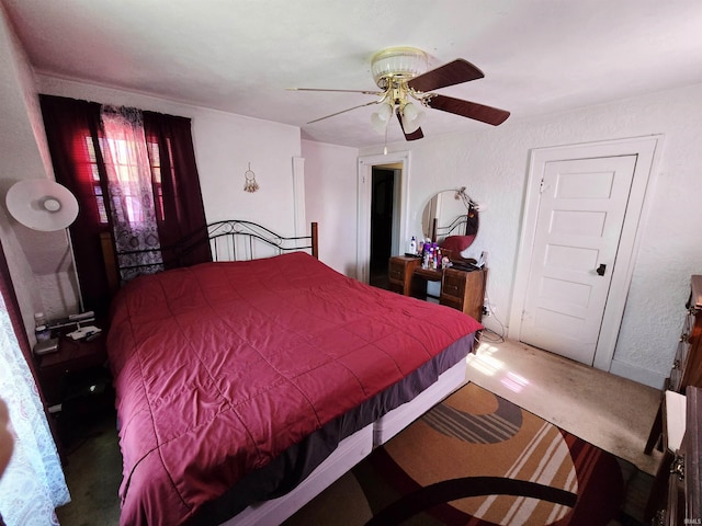 130 W 2nd St, Rochester, IN 46975 - bedroom with carpet flooring, a textured wall, and ceiling fan