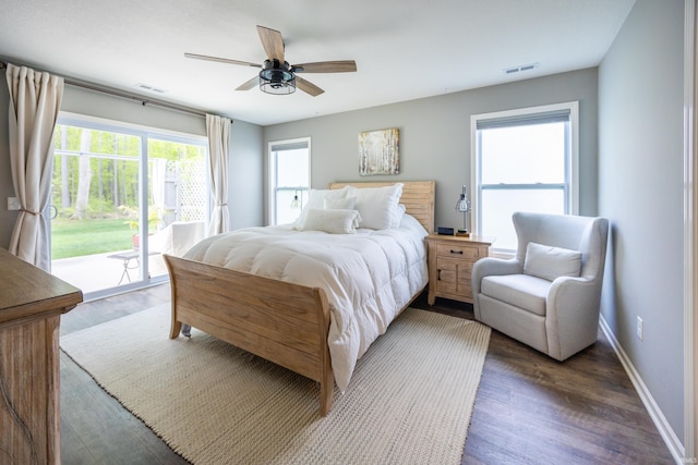 13865 Escondida Cv, Fort Wayne, IN 46845 - bedroom featuring access to exterior, wood finished floors, ceiling fan, and baseboards
