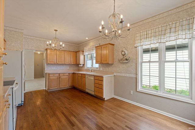 3821 Emerald Bay St, Mishawaka, IN 46545 - kitchen featuring white appliances, a chandelier, light brown cabinets, wood finished floors, and baseboards