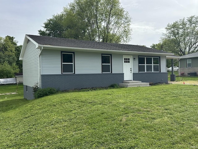 916 2nd Ave, Jasper, IN 47546 - ranch-style house featuring brick siding, a front yard, and cooling unit