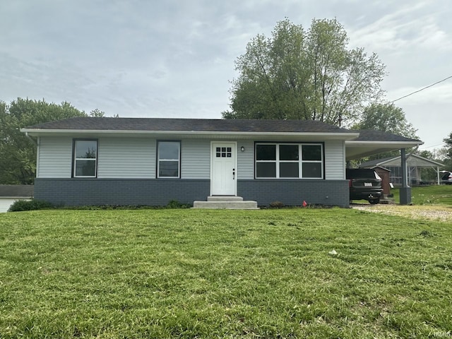 916 2nd Ave, Jasper, IN 47546 - single story home with brick siding, a carport, and a front yard
